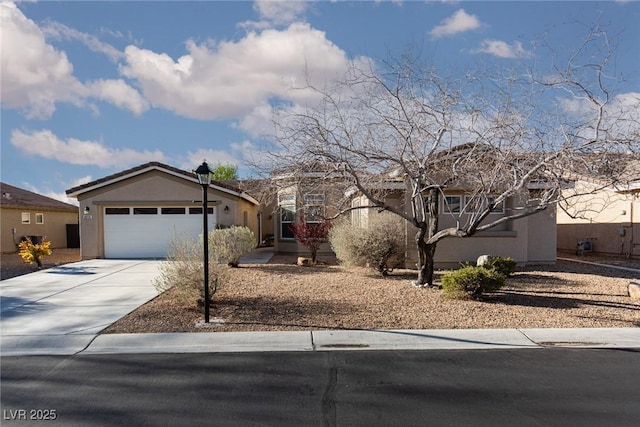 8213 Cabin Springs Ave, Las Vegas, NV 89131 - ranch-style home with concrete driveway, stucco siding, and a garage