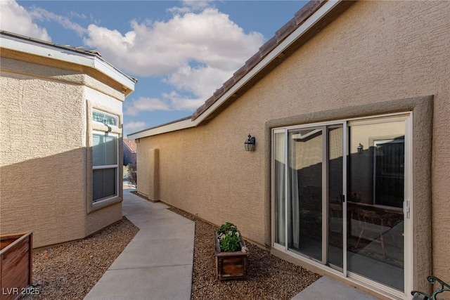 8213 Cabin Springs Ave, Las Vegas, NV 89131 - entrance to property with stucco siding