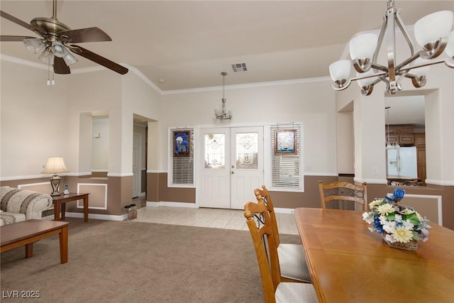 8213 Cabin Springs Ave, Las Vegas, NV 89131 - dining area featuring a chandelier, crown molding, light carpet, a ceiling fan, and lofted ceiling