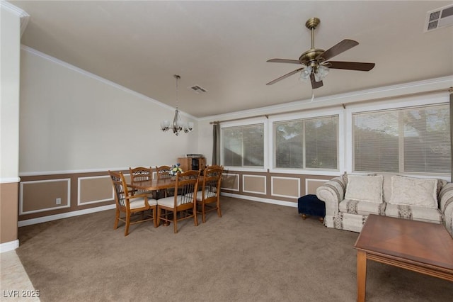 8213 Cabin Springs Ave, Las Vegas, NV 89131 - carpeted dining space featuring ornamental molding, a ceiling fan, healthy amount of natural light, lofted ceiling, and a chandelier