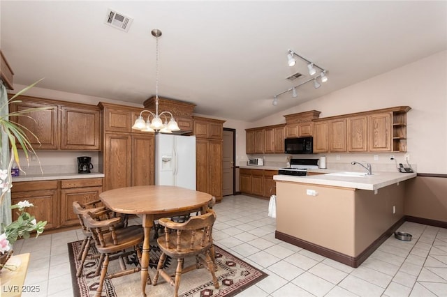 8213 Cabin Springs Ave, Las Vegas, NV 89131 - kitchen featuring white appliances, a peninsula, lofted ceiling, open shelves, and brown cabinetry