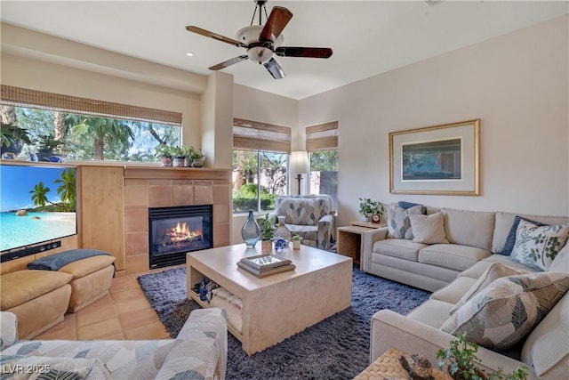 10320 Luxembourg Ave, Las Vegas, NV 89145 - tiled living area featuring a tiled fireplace, a ceiling fan, and recessed lighting