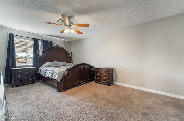 327 Fuente Dr, Henderson, NV 89014 - carpeted bedroom with a textured ceiling and a ceiling fan