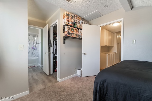 327 Fuente Dr, Henderson, NV 89014 - bedroom with a textured ceiling and light carpet