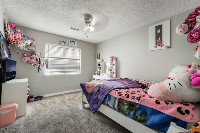 327 Fuente Dr, Henderson, NV 89014 - bedroom with carpet floors, a ceiling fan, and a textured ceiling