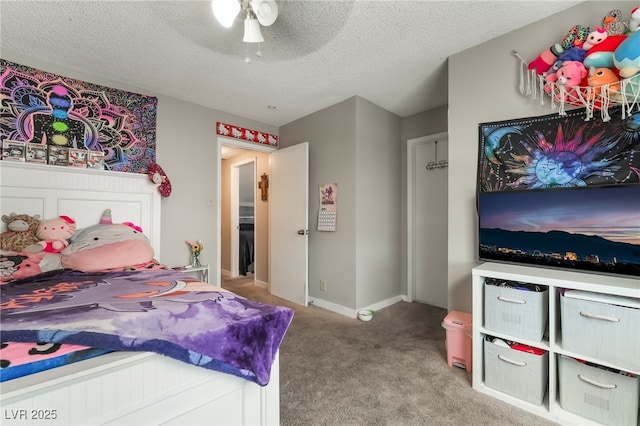 327 Fuente Dr, Henderson, NV 89014 - bedroom with carpet, a textured ceiling, and ceiling fan