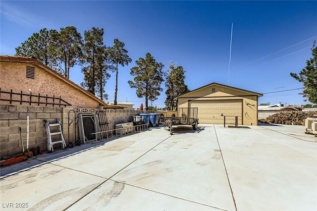 3557 Wayne Cir, Las Vegas, NV 89121 - view of side of home with a garage and an outdoor structure