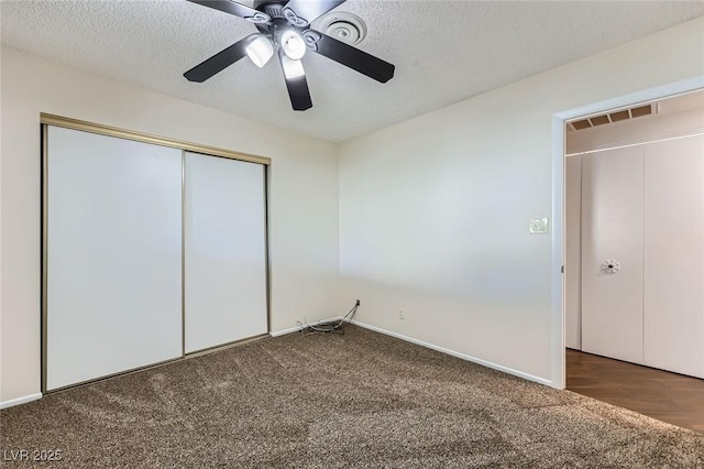 3557 Wayne Cir, Las Vegas, NV 89121 - unfurnished bedroom featuring carpet, a closet, a textured ceiling, and a ceiling fan