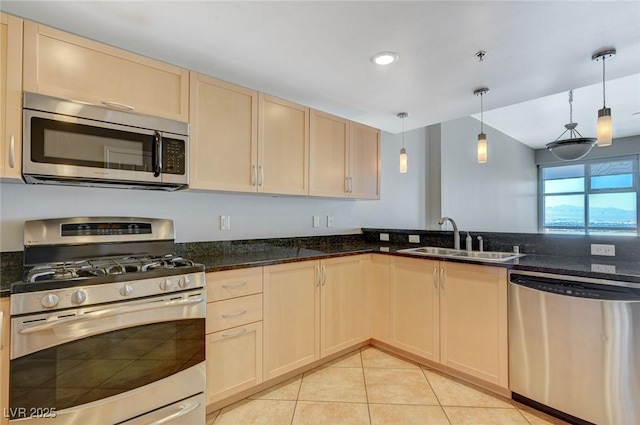 150 Las Vegas Blvd Unit 1716, Las Vegas, NV 89101 - kitchen with appliances with stainless steel finishes, light brown cabinets, light tile patterned floors, pendant lighting, and recessed lighting