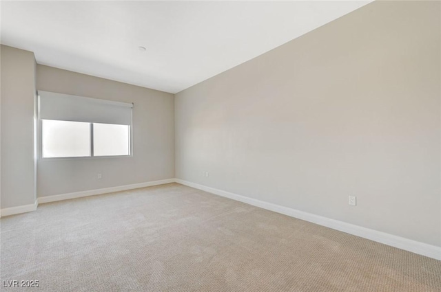 150 Las Vegas Blvd Unit 1716, Las Vegas, NV 89101 - spare room featuring light carpet and baseboards