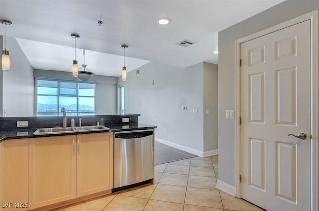 150 Las Vegas Blvd Unit 1716, Las Vegas, NV 89101 - kitchen with dishwasher, light tile patterned floors, hanging light fixtures, recessed lighting, and light brown cabinets