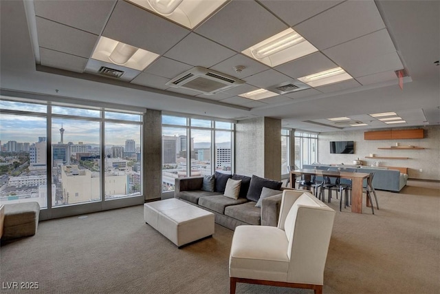 150 Las Vegas Blvd Unit 1716, Las Vegas, NV 89101 - carpeted living area featuring a drop ceiling and expansive windows