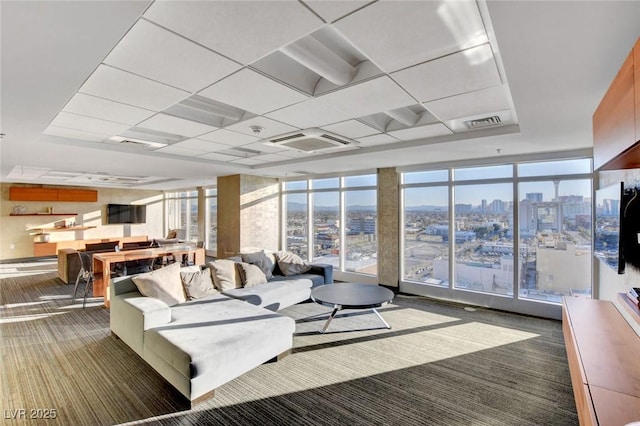 150 Las Vegas Blvd Unit 1716, Las Vegas, NV 89101 - carpeted living room featuring a wall of windows