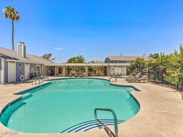 5861 Medallion Dr Unit 202, Las Vegas, NV 89122 - community pool with a patio area