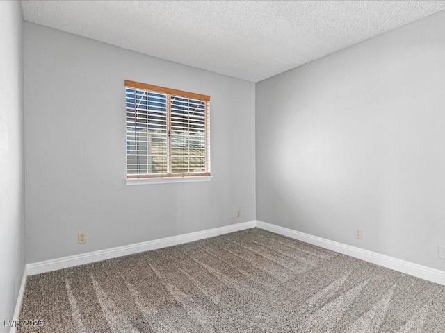 5861 Medallion Dr Unit 202, Las Vegas, NV 89122 - empty room featuring a textured ceiling and carpet