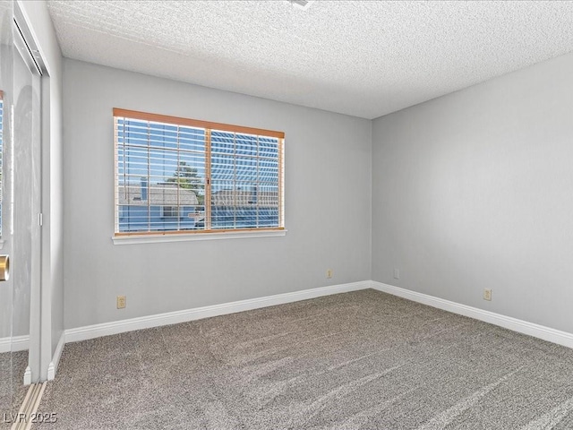 5861 Medallion Dr Unit 202, Las Vegas, NV 89122 - carpeted spare room featuring a textured ceiling