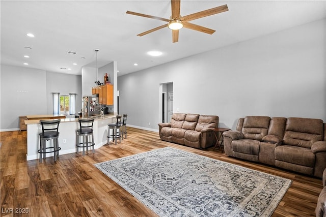 4212 Helens Pouroff Ave, North Las Vegas, NV 89085 - living room featuring ceiling fan, wood finished floors, and recessed lighting