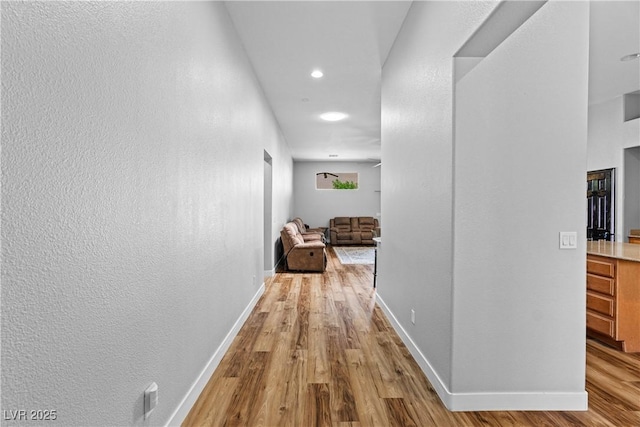 4212 Helens Pouroff Ave, North Las Vegas, NV 89085 - corridor featuring wood finished floors, recessed lighting, and a textured wall