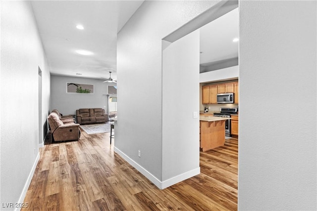 4212 Helens Pouroff Ave, North Las Vegas, NV 89085 - hall featuring wood finished floors and recessed lighting