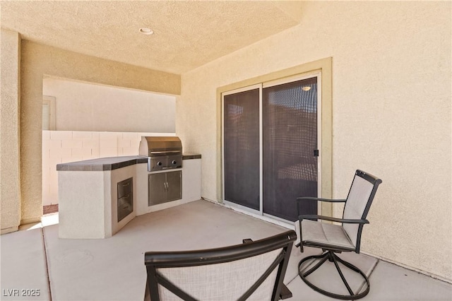 4212 Helens Pouroff Ave, North Las Vegas, NV 89085 - view of patio / terrace featuring exterior kitchen