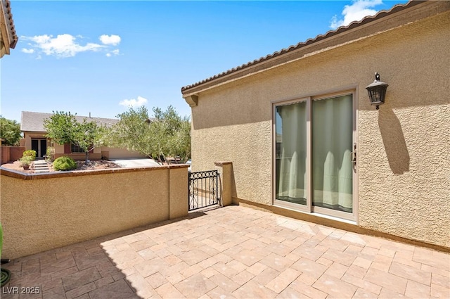 4212 Helens Pouroff Ave, North Las Vegas, NV 89085 - view of patio / terrace with a gate