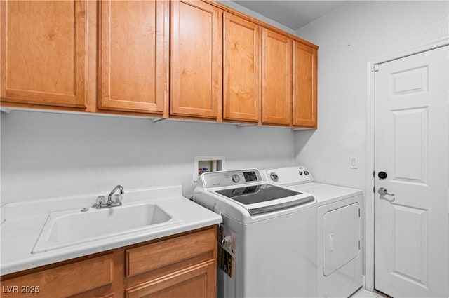 4212 Helens Pouroff Ave, North Las Vegas, NV 89085 - laundry area with cabinet space and washer and clothes dryer