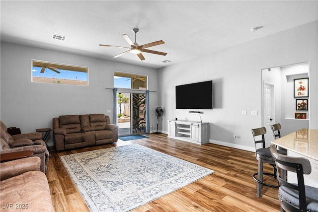4212 Helens Pouroff Ave, North Las Vegas, NV 89085 - living room featuring a ceiling fan and wood finished floors