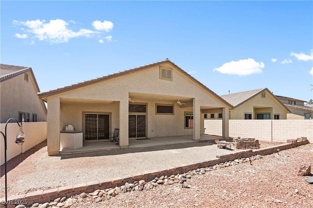 4212 Helens Pouroff Ave, North Las Vegas, NV 89085 - back of house featuring a patio area, a fenced backyard, a ceiling fan, and stucco siding