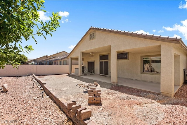 4212 Helens Pouroff Ave, North Las Vegas, NV 89085 - back of house with a patio area, a fenced backyard, stucco siding, and ceiling fan