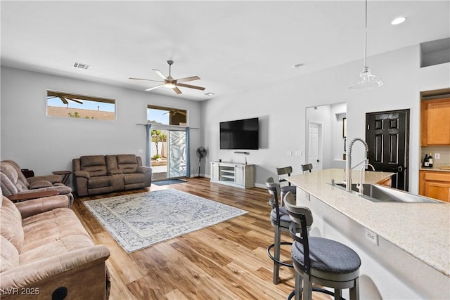 4212 Helens Pouroff Ave, North Las Vegas, NV 89085 - living area with ceiling fan, wood finished floors, and recessed lighting