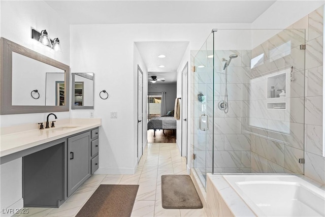 4212 Helens Pouroff Ave, North Las Vegas, NV 89085 - ensuite bathroom with a shower stall, vanity, a garden tub, a ceiling fan, and recessed lighting