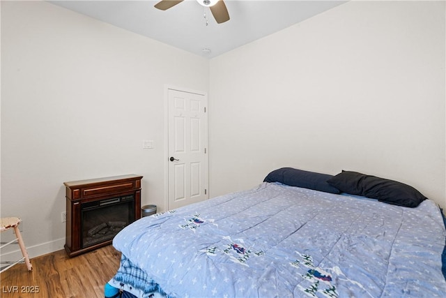 4212 Helens Pouroff Ave, North Las Vegas, NV 89085 - bedroom with wood finished floors and ceiling fan