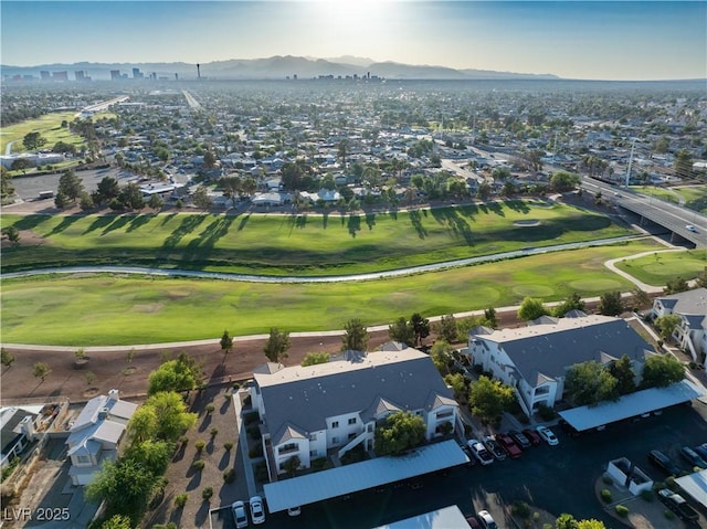 5655 E Sahara Ave Unit 1053, Las Vegas, NV 89142 - aerial view of property and surrounding area featuring a mountain backdrop and nearby suburban area
