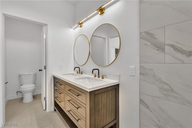 8944 W Rochelle Ave, Las Vegas, NV 89147 - bathroom featuring double vanity and toilet