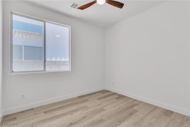 8944 W Rochelle Ave, Las Vegas, NV 89147 - unfurnished room featuring healthy amount of natural light, wood finished floors, and ceiling fan