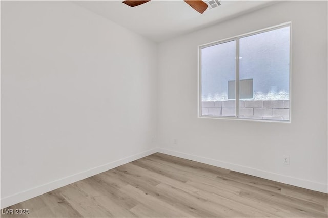 8944 W Rochelle Ave, Las Vegas, NV 89147 - unfurnished room with light wood-type flooring, healthy amount of natural light, and ceiling fan