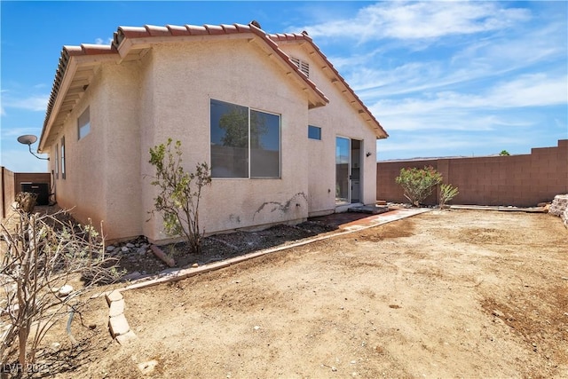 8944 W Rochelle Ave, Las Vegas, NV 89147 - view of side of home with stucco siding and a fenced backyard