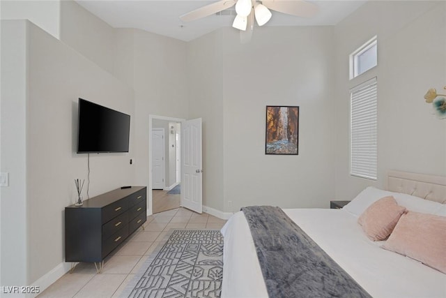 5512 Goldbrush St, Las Vegas, NV 89130 - bedroom with a high ceiling, light tile patterned floors, and ceiling fan