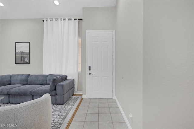 5512 Goldbrush St, Las Vegas, NV 89130 - living area with light tile patterned floors and baseboards