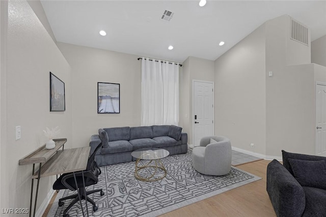 5512 Goldbrush St, Las Vegas, NV 89130 - living area featuring light wood finished floors and recessed lighting