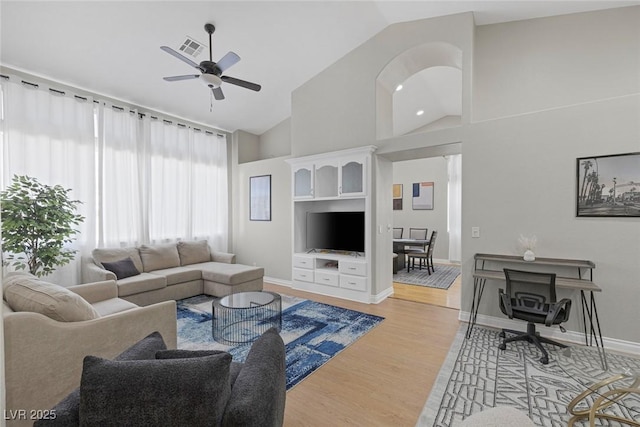 5512 Goldbrush St, Las Vegas, NV 89130 - living area with a ceiling fan, light wood-style flooring, and high vaulted ceiling
