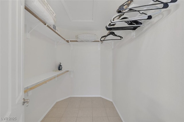 5512 Goldbrush St, Las Vegas, NV 89130 - walk in closet with light tile patterned floors