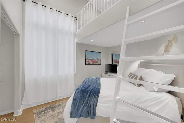 5512 Goldbrush St, Las Vegas, NV 89130 - bedroom with wood finished floors and baseboards