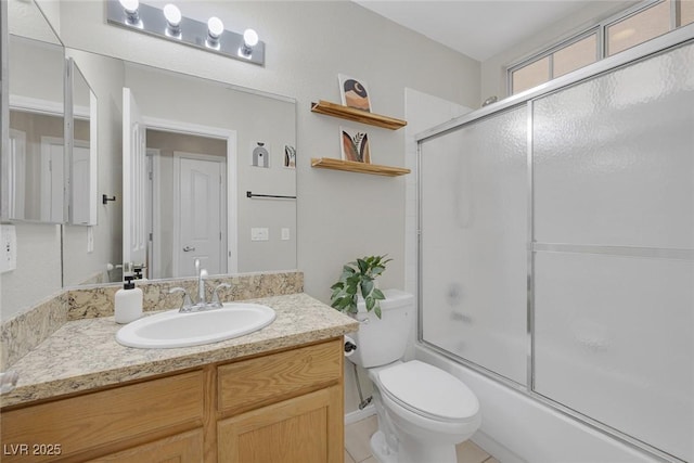 5512 Goldbrush St, Las Vegas, NV 89130 - bathroom featuring vanity, combined bath / shower with glass door, and tile patterned flooring