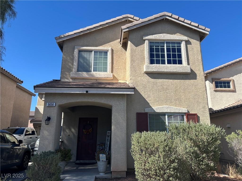 5656 Fast Payout Ct, Las Vegas, NV 89122 - view of front of home featuring stucco siding