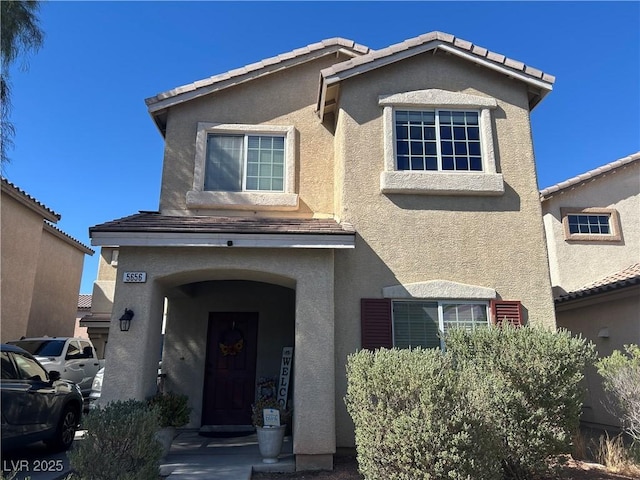 5656 Fast Payout Ct, Las Vegas, NV 89122 - view of front of home featuring stucco siding