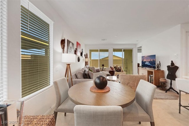 2261 Cold Canyon Ave, North Las Vegas, NV 89086 - dining area with light tile patterned floors