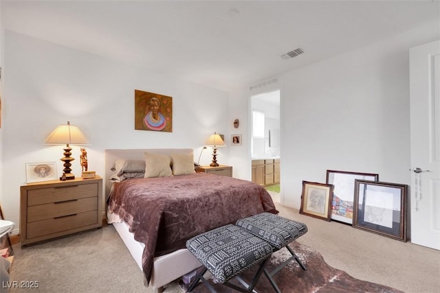 2261 Cold Canyon Ave, North Las Vegas, NV 89086 - bedroom featuring light colored carpet and ensuite bath