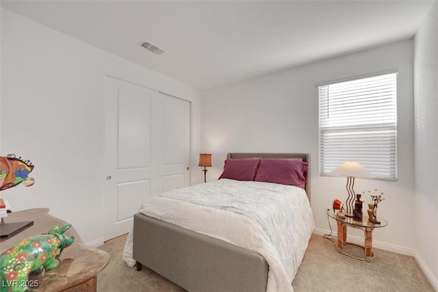 2261 Cold Canyon Ave, North Las Vegas, NV 89086 - bedroom featuring light carpet and a closet