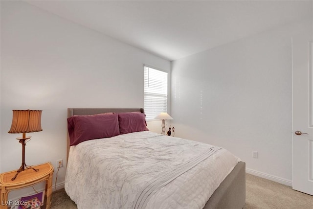 2261 Cold Canyon Ave, North Las Vegas, NV 89086 - bedroom featuring light carpet and baseboards